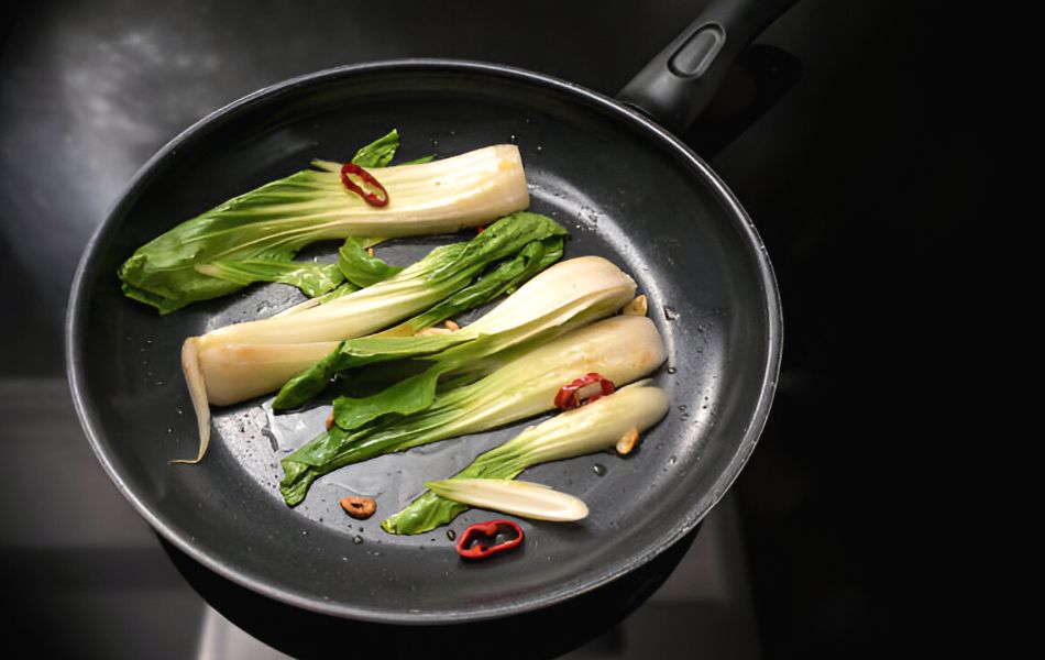 Stir-frying bok choy 1